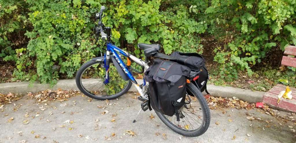 trek commuter bicycle with a rear rack and two Ibera panniers